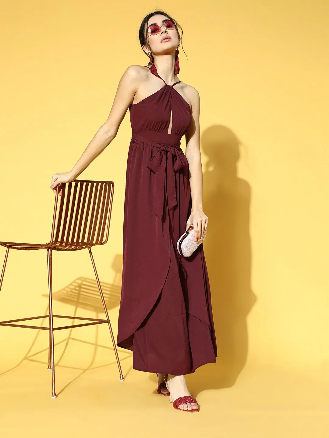 Berrylush Women Solid Maroon Halter Nack Front Cutout Tie-Up Waist Asymmetrical Hem Slited Maxi Dress