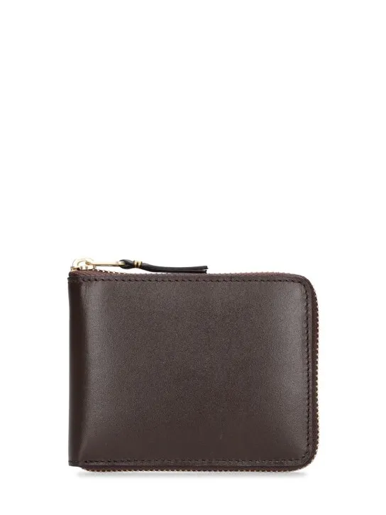 Comme des Garçons Wallet   Leather zip wallet 