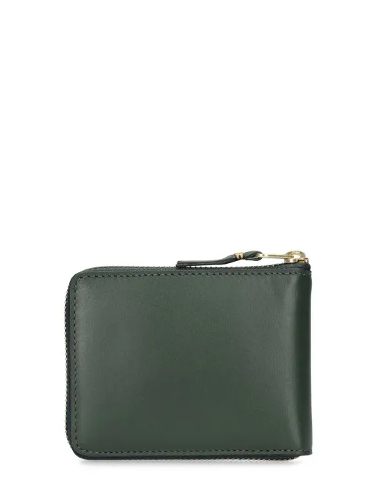 Comme des Garçons Wallet   Leather zip wallet 