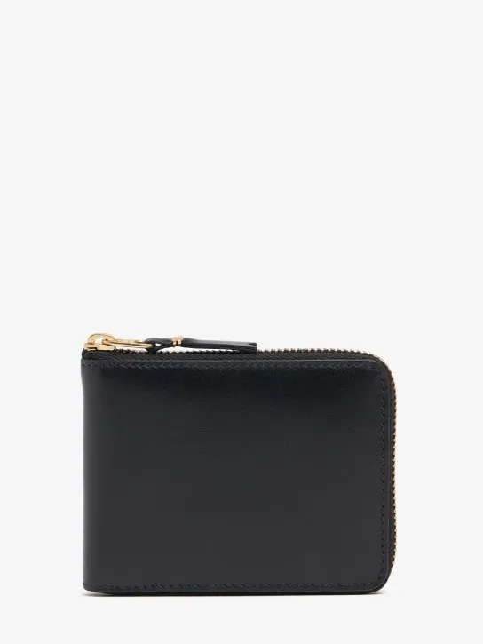 Comme des Garçons Wallet   Leather zip wallet 