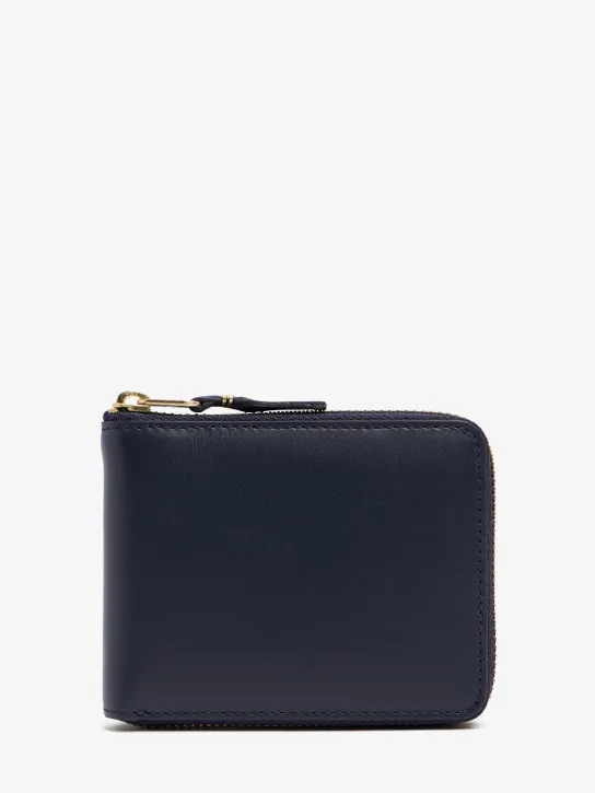 Comme des Garçons Wallet   Leather zip wallet 