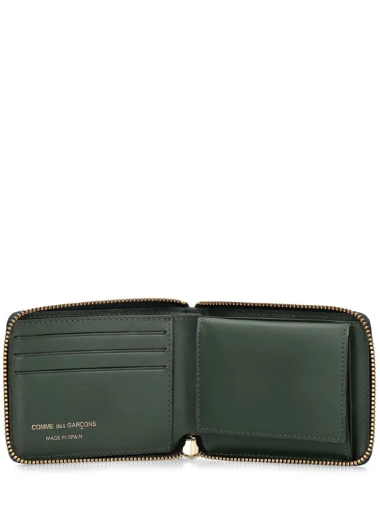 Comme des Garçons Wallet   Leather zip wallet 