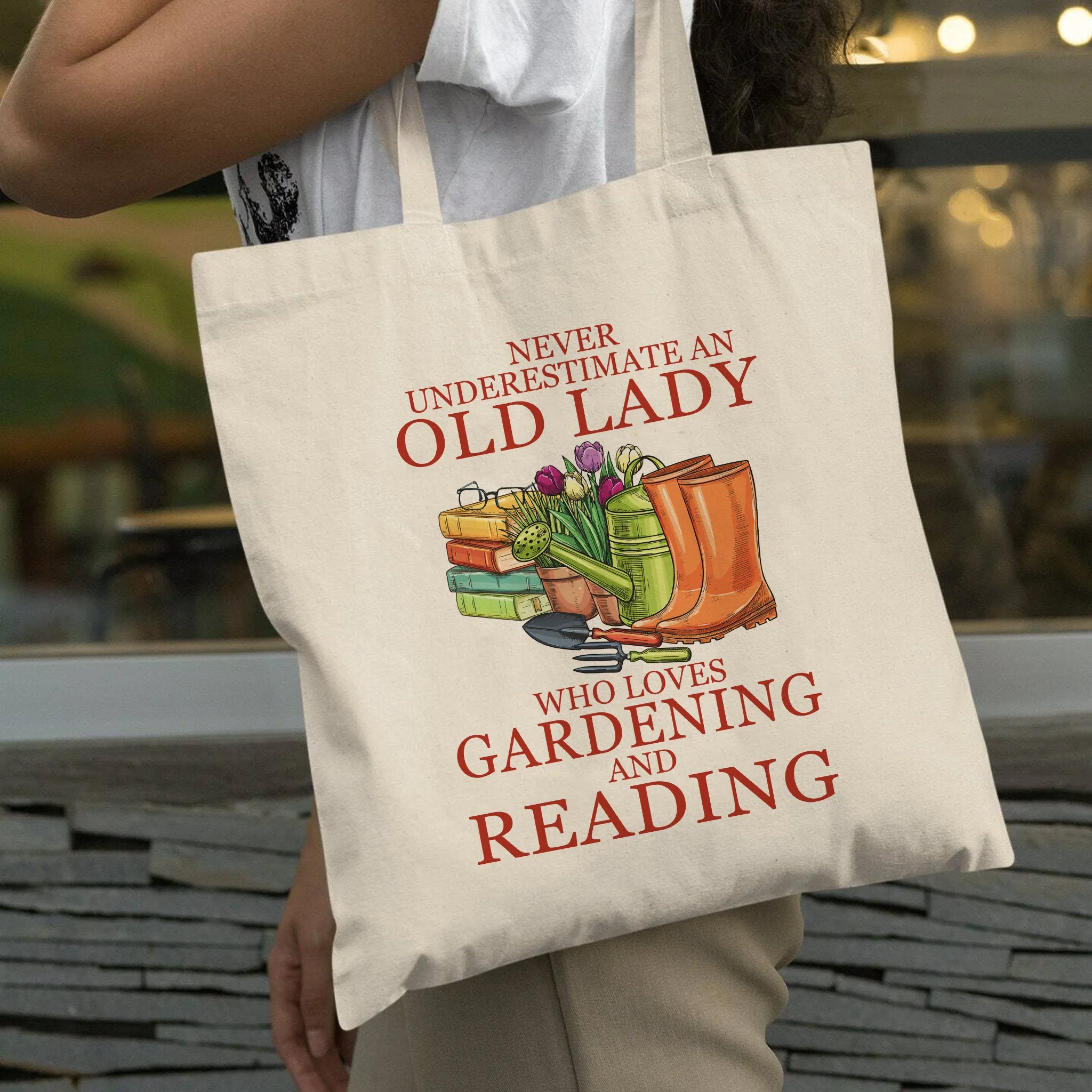 Never Underestimate An Old Lady Who Loves Gardening And Reading Book Lover Gift TBW179