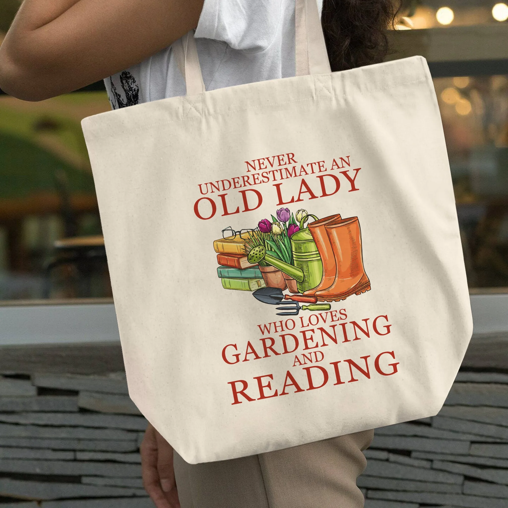 Never Underestimate An Old Lady Who Loves Gardening And Reading Book Lover Gift TBW179